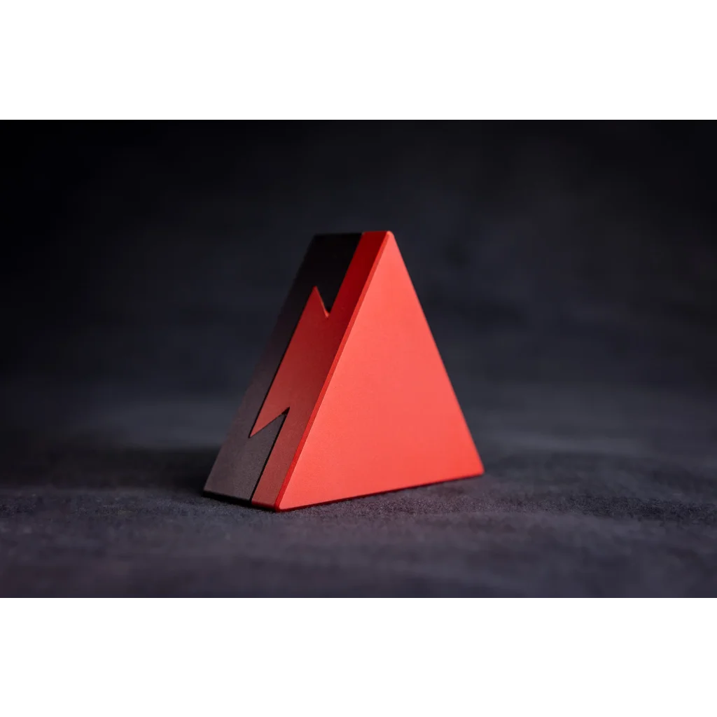 Crypted, crypt3d is a mechanical puzzle dovetail triangle in fiery red and black 