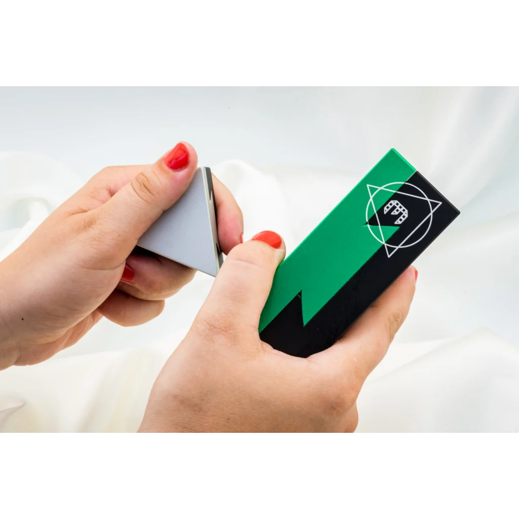 A woman holding a UNLIMIT3D Cl3inod business card in green and black.