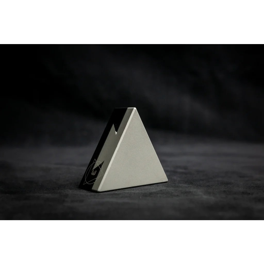 CRYPT3D, crypted is a mechanical puzzle dovetail triangle in sleek silver and black background